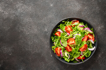 Fresh salad with leaves and vegetables.