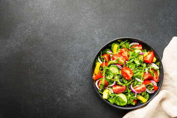 Fresh salad with leaves and vegetables.