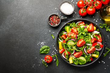 Fresh salad with leaves and vegetables.