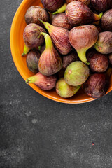 Figs fresh ripe fruit natural product tasty snack fresh delicious gourmet food background on the table rustic top view copy space diet vegan and vegan food
