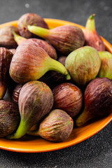 Figs fresh ripe fruit natural product tasty snack fresh delicious gourmet food background on the table rustic top view copy space diet vegan and vegan food
