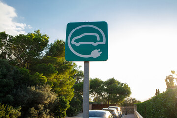 Green road sign of electric car charging on Mallorca island in Spain