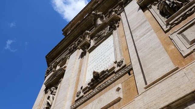 bottom up figurines statues arches windows basilica papale di santa maria maggiore rome architectural grandeur upward view perspective details 