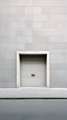 Urban closed garage door on minimalist gray wall. Vertical photo