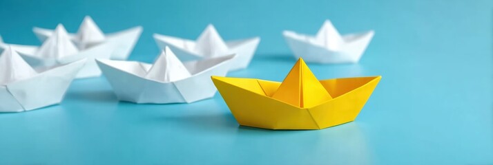 Boat paper concept yellow ship business leadership leader lead origami partnership. Background boat paper concept change journey success crew blue compass unique different fleet join team challenge