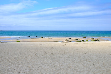 Fototapeta premium A beautiful and serene beach landscape with white sand, Idyllic Paradise