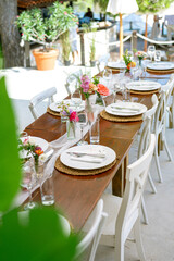 table setting in a restaurant on a wedding day