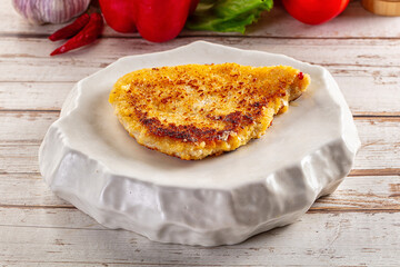 Breaded crispy chicken schnitzel