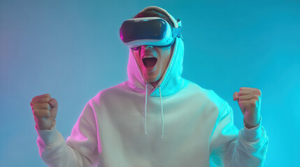 Excited young man playing immersive game using virtual reality headset