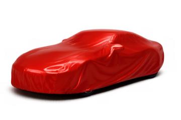 New red car under a protective cover, creating anticipation for a fresh model reveal against a transparent background