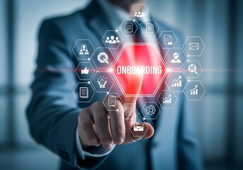 Businessman touching a digital interface with icons representing business and technology concepts for growth and success