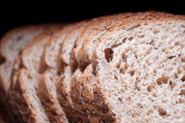 Slices of grain bread in close-up.