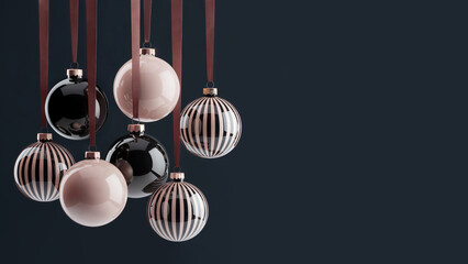 Black and rose gold color Christmas ornament hanging on deep blue background.  Space for text. 