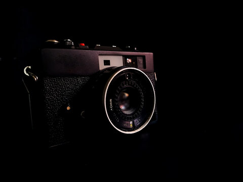 old photo camera on black