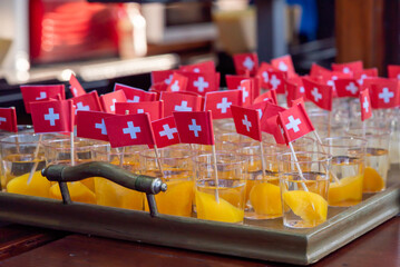 Swiss National Day Celebration Drinks with Swiss Flags in Switzerland.