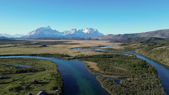 Torres del Paine, Chile: Aerial drone view of Serrano river near Torres del Paine National park of Patagonia, Chile with Cordillera del Paine in the background. Taken with orbit motion