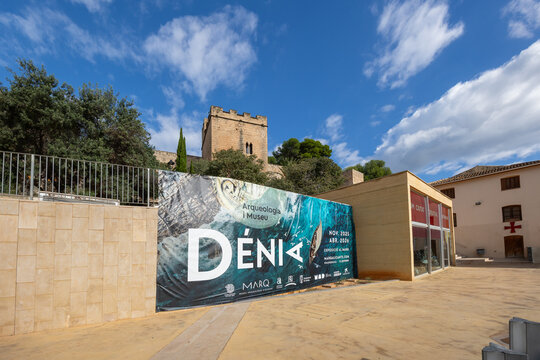 Denia castle with arqueologia i museu banner