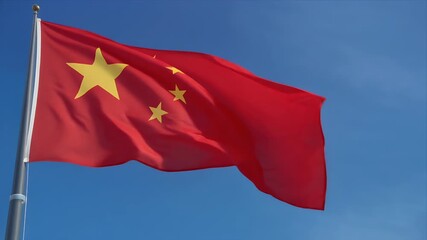 Dynamic Chinese flag waving proudly against a clear blue sky, symbolizing national pride.