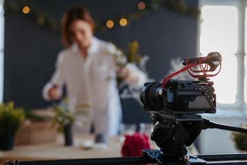 Content creator recording video tutorial for social media.