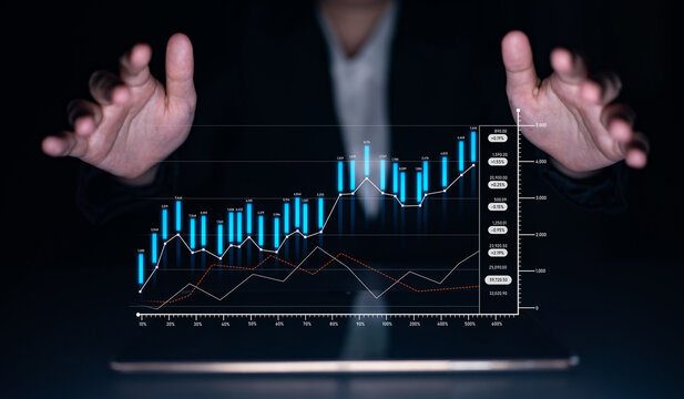 A business professional presents a digital interface showing financial growth with graphs and charts. The image illustrates data analysis and investment trends in a modern workspace. Scalp