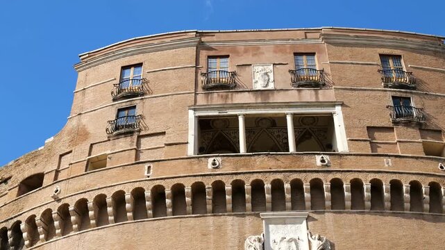 windows balconies decorate upper castel sant'angelo also known mausoleum hadrian rome front of historic architecture monumental building 