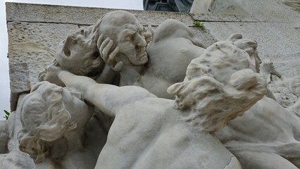 Rome, Italy – 11 January 2025. A striking marble relief from the Mazzini monument showing dynamic...