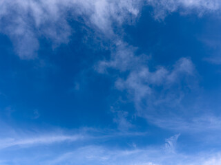 Vibrant Blue Sky Background with Wispy Cirrus Clouds