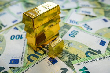 Euro money and gold bullion symbolizing economy trend, currency rate and financial performance