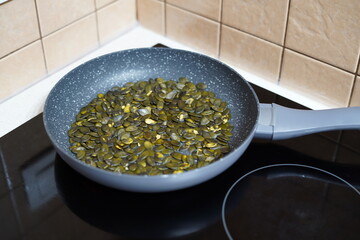 roasted pumpkin seeds in a pan