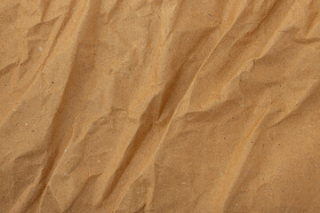 Abstract wrinkled brown crumpled paper texture background