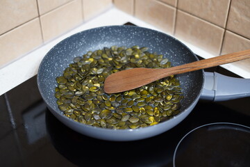 roasted pumpkin seeds in a pan