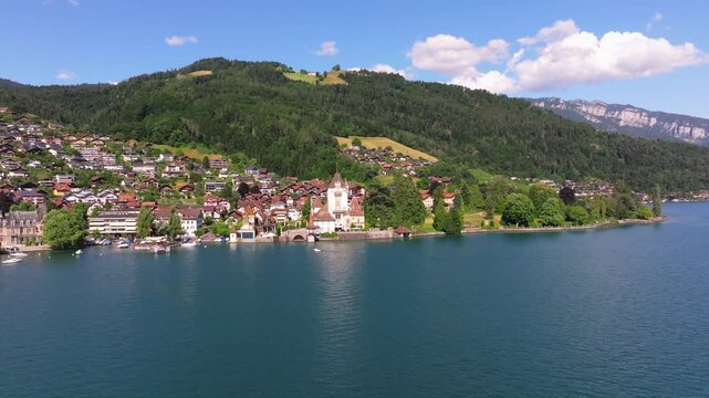 The beautiful Interlaken valley and Thunersee lake, Beatiful river at Switzerland in sunny day during summer, Aereal drone view of stunning idyllic nature scenery of lake Brienz with turquoise waters