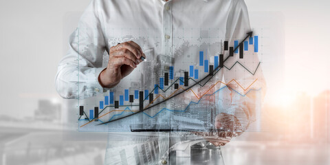 A businessman evaluates financial growth trends using a digital screen with graphs in a modern office. This dynamic scene captures strategic analysis and insights. Impute