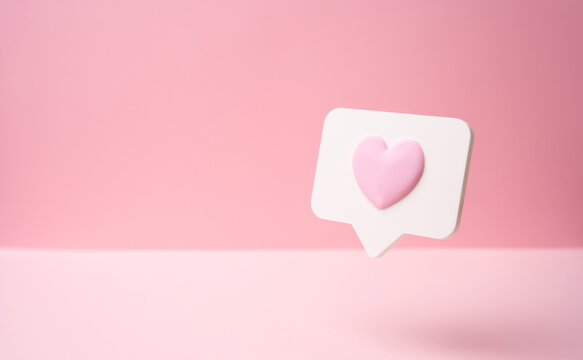 A comment and like hover on a pink background. A favorite in shopping and social media. Online engagement, user interaction, and influencer culture. Valentine's Day