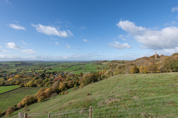 Naklejka premium Landscape photo of the autumn colours at Admiral Hood Monument overlooking the village of Compton Dundon in somerset