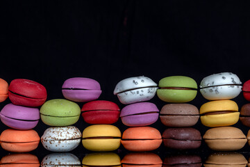 colorful macaroons on a wooden table