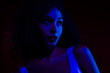 Portrait of a Young Woman in Neon Blue and Red Lighting Showcasing Beauty, Style, and Contemporary Art in a Studio