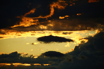Dramatic cloudy sky with soft light tones