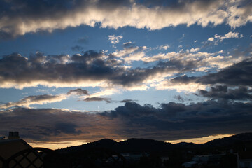 Dramatic cloudy sky with soft light tones