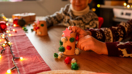 Christmas crafts: festive artwork of trees and reindeer made by children