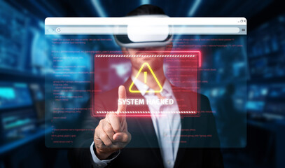 A business professional in virtual reality glasses interacts with a digital warning about a cyber attack, highlighting the importance of digital security and risk management. XDMCP