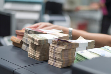 Counting Money in Bank Office &ndash; Finance, Cash Flow and Investment Concept