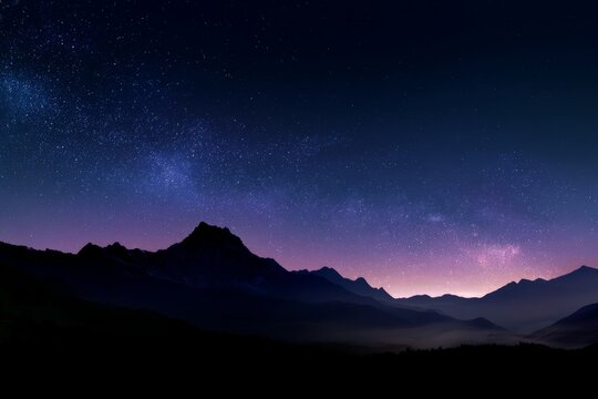 Clear night sky reveals a breathtaking view of the mountain silhouette and stars over a peaceful valley