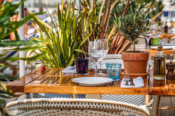 Al fresco tables waiting for customers at an outdoor restaurant in Nice, France