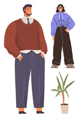 Fashionable man in sweater and trousers beside a woman in hoodie and baggy pants, paired with a decorative plant. Ideal for fashion, lifestyle, apparel, modern trends, casual style, minimal decor