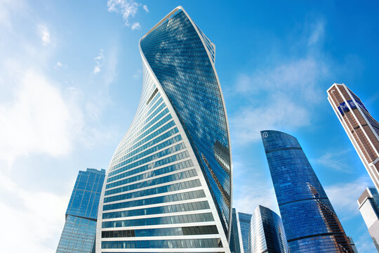 Beautiful high skyscrapers against the backdrop of a bright blue sky: Moscow, Russia - October 12, 2022
