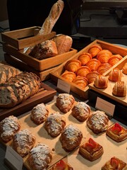 Fresh pastries and artisan bread assortment in bakery display
