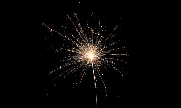 A firework is lit up in the dark