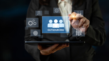 Outsourcing concept showing collaboration, delegation, global workforce, productivity, and task management through remote teams and external service providers Latch