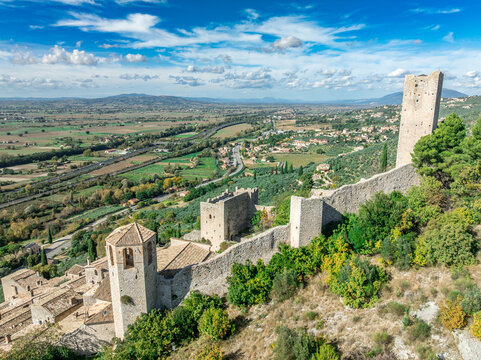 Aerial view of Pissignano: A Beautifully Restored Medieval Hilltop Hamlet in Umbria, Home to the Ancient Temple of Clitumnus